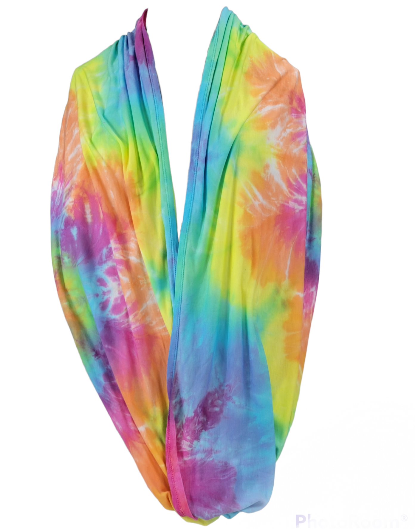 View of infinity scarf tie-dyed in a pastel rainbow flower pattern, shown draped around the shoulders as a shawl.
