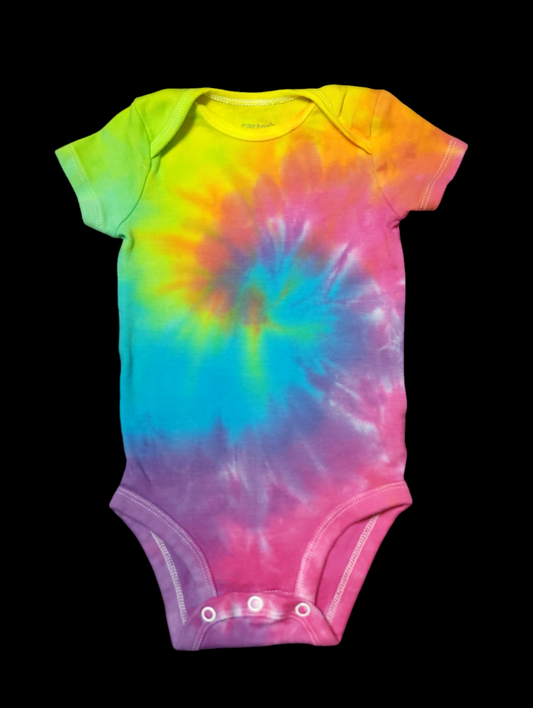 Front view of onesie for babies 3-6 months. Spiral design in soft pastel rainbow hues in the center of the piece.